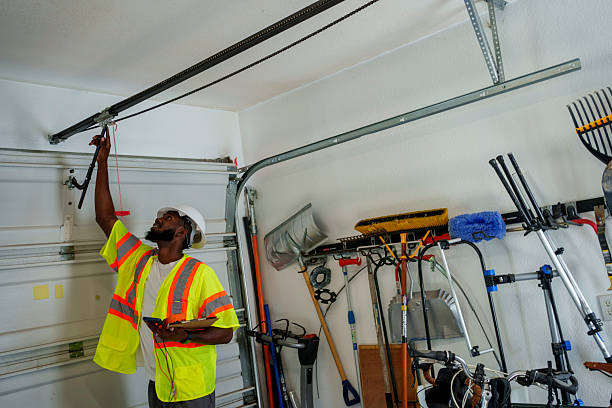 Professional Garage Door Installation technician working in Collier County County, FL